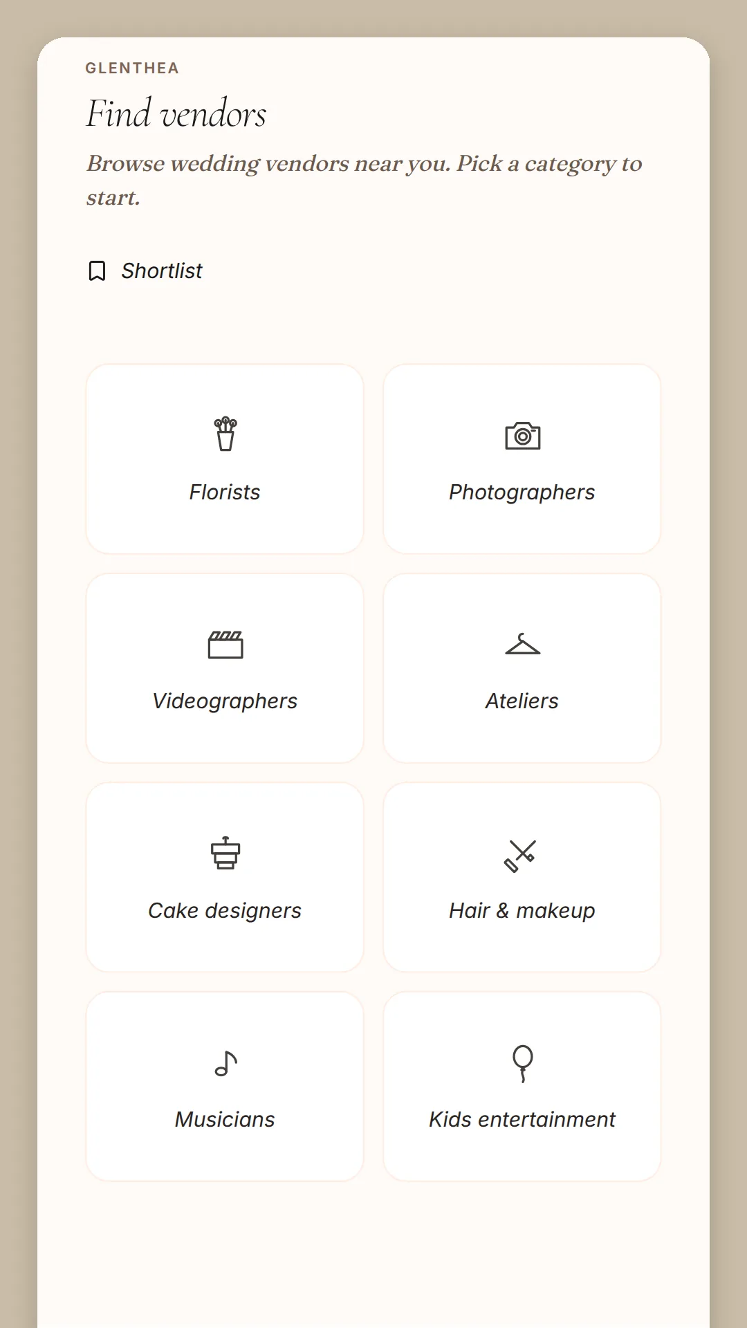 Phone screen: Find vendors, a Shortlist link and tiles for florists, photographers, videographers, ateliers, cake designers, hair and makeup, musicians and children's entertainment.